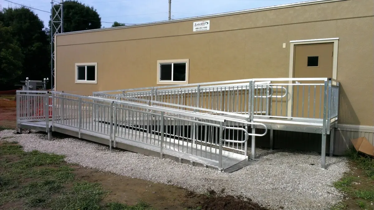 ADA compliant wheelchair ramp with aluminum railings installed by AlliedFenceAndGate.com™