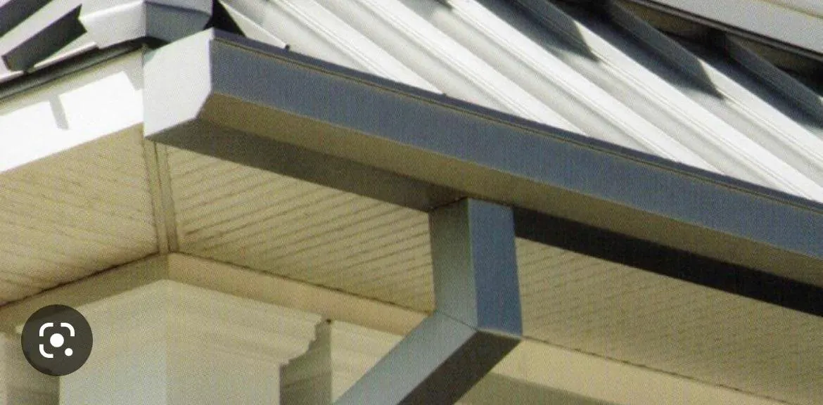 Box gutter profile close-up showing clean seamless installation